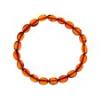 Cognac-colored oval amber elastic bracelet