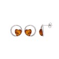 Rhodium-plated silver circle earrings adorned with an amber heart