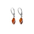 Rhodium silver earrings with an amber stone