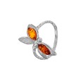Dragonfly-shaped ring in honey amber and rhodium silver