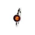 Round ring in cognac-colored Amber and rhodium-plated silver frame