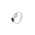 Adjustable oval amber ring with leaf frame in rhodium silver