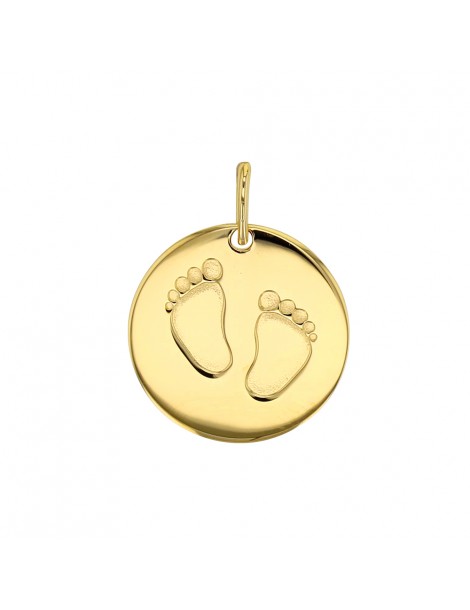 Round medal with a gold plated footprint