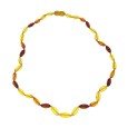 Necklace adorned with large amber stone, screw clasp